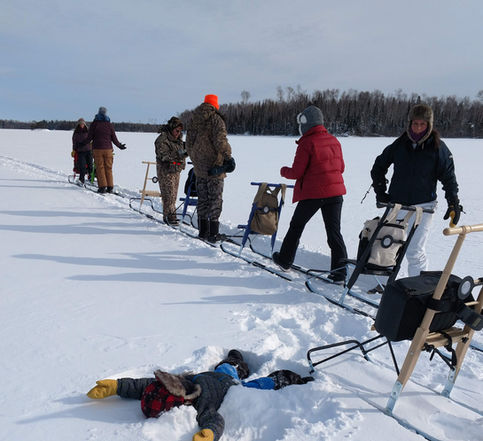 Enjoying the fresh air and snow during a winter kicksledding adventure.